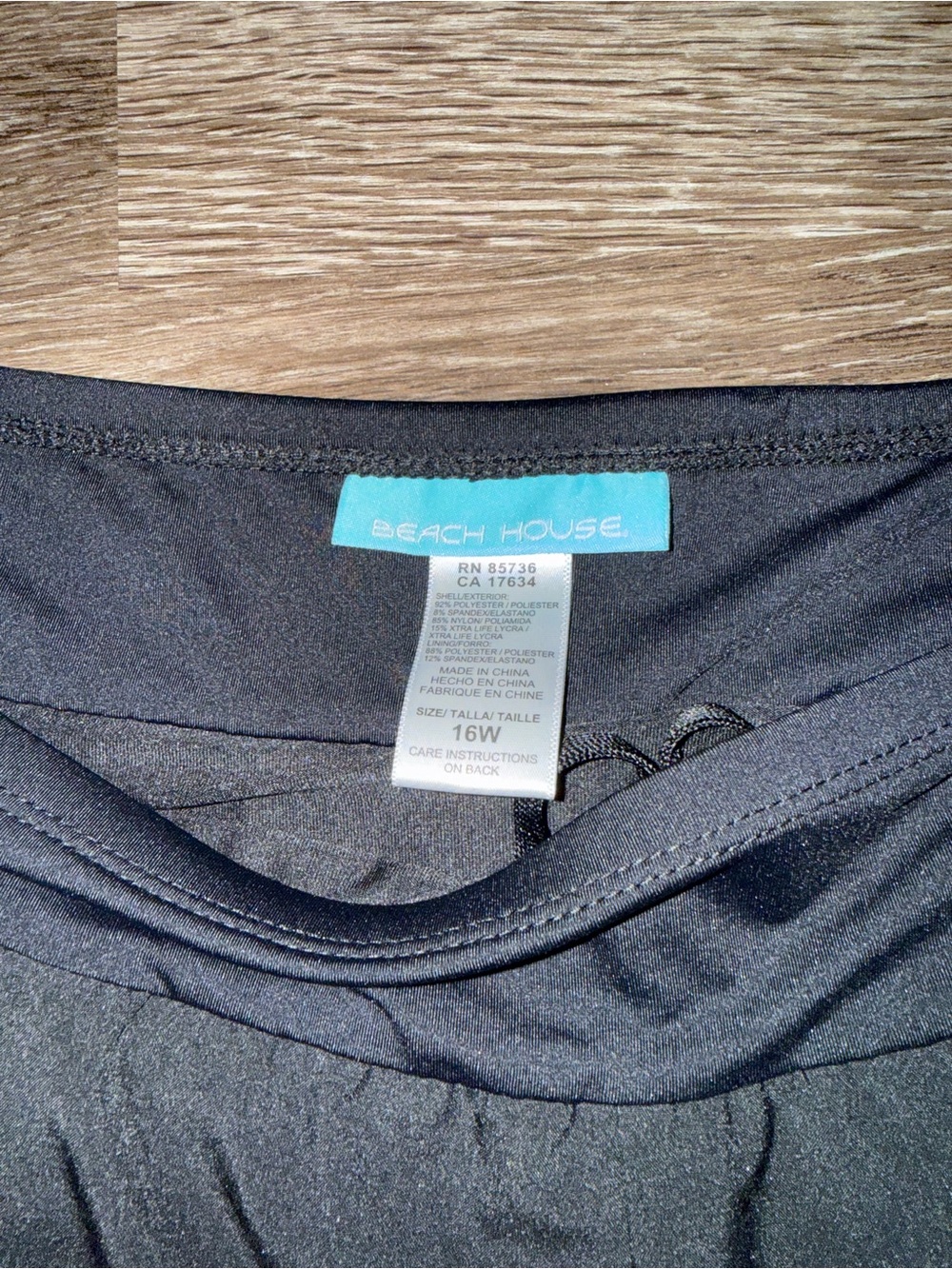 Beach House woman’s black swim shorts.